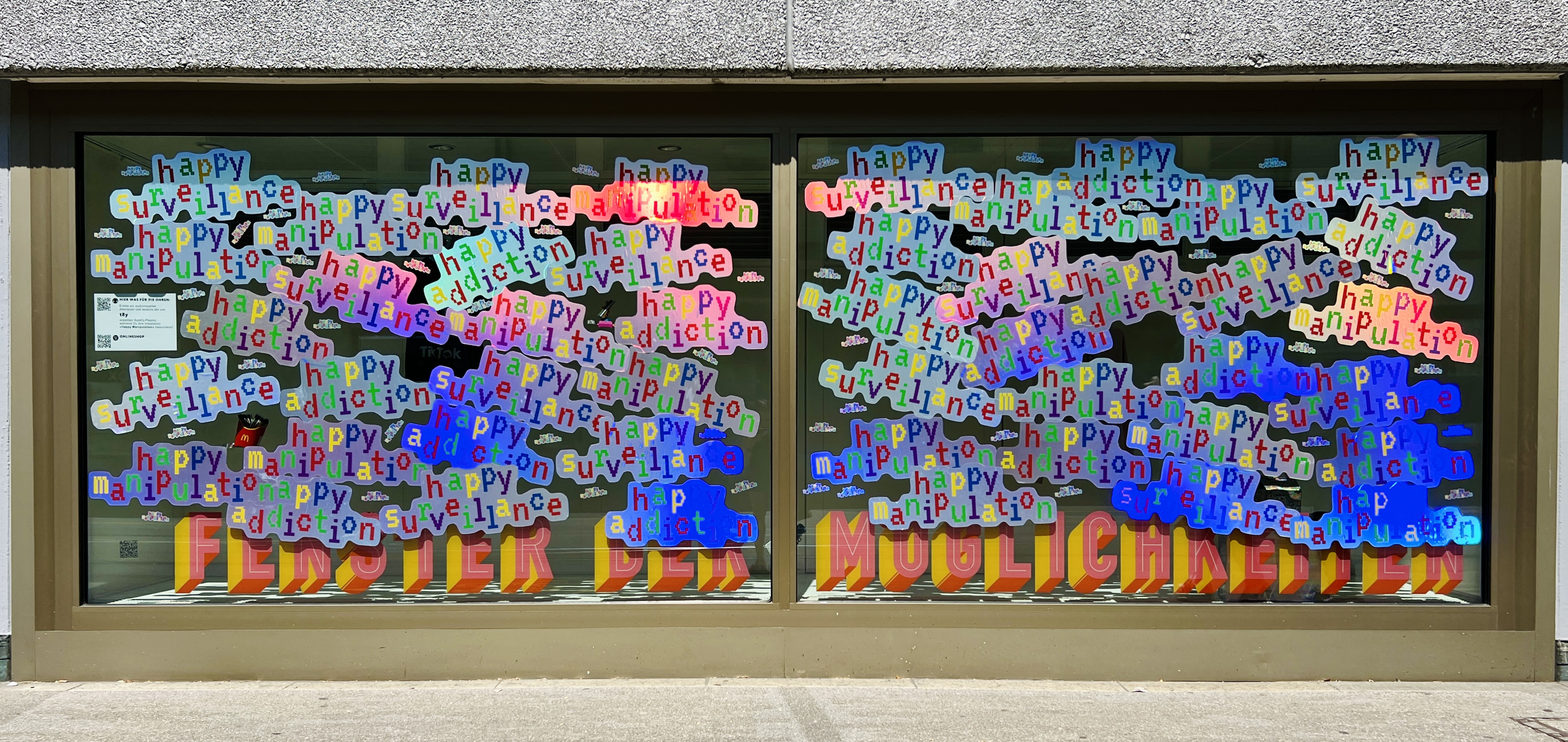Happy Manipulation — shop window with happy surveillance manipulation addiction